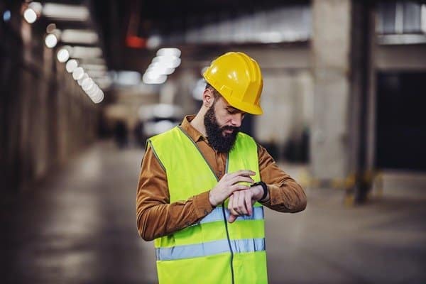 ask a contractor questions about their timeline while contractor checks time